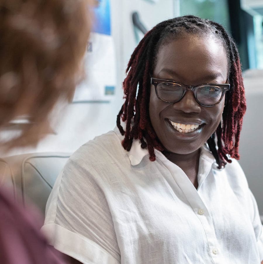 We Support Your Effective Operation Within Your Community Women discussing the support at ICU Mobile