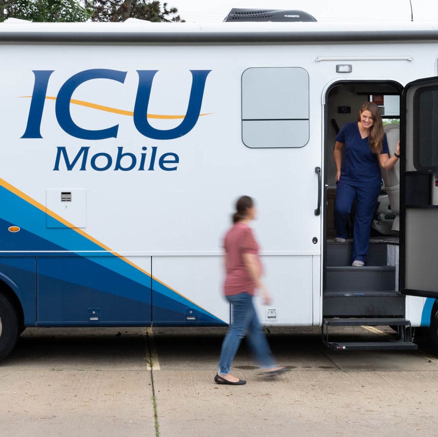 We Equip Mobile Medical Units A woman meeting the medical professional at the ICU Mobile Care Unit