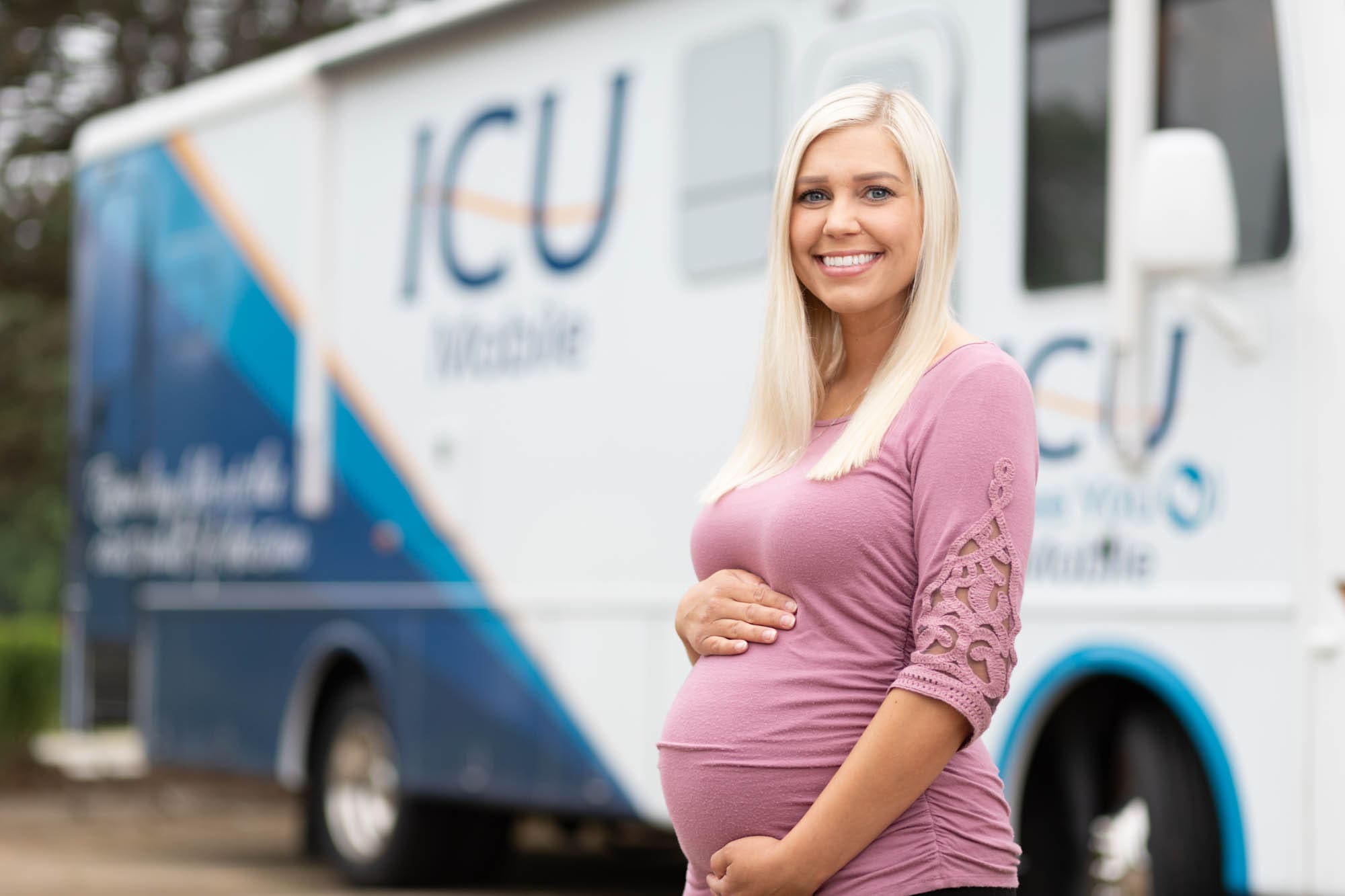 A woman leaving ICU Mobile satifies with the service she received