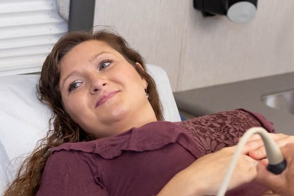Our Calling A woman receiving an ultrasound at ICU Mobile