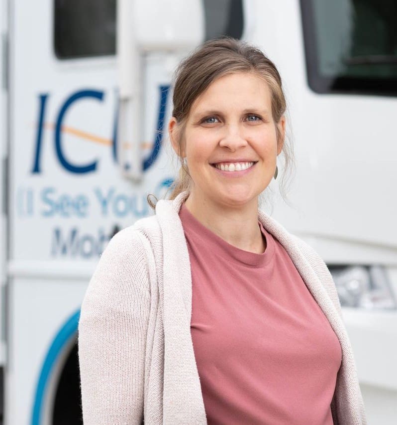 A woman leaving ICU Mobile satifies with the service she received
